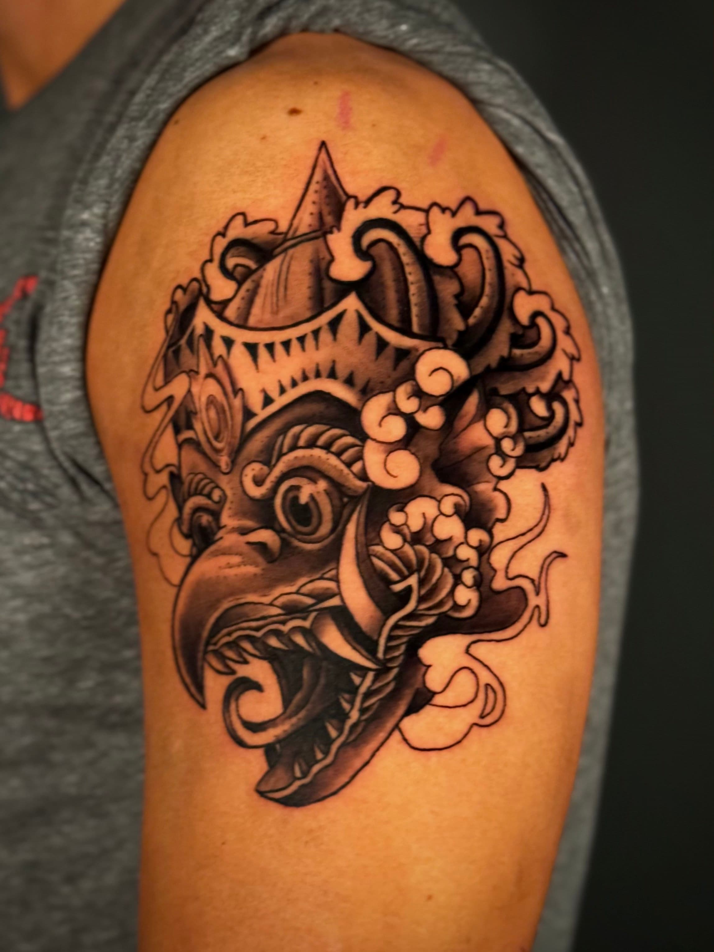 Black & Grey Garuda Mask Tattoo